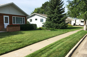 Client's home with perfect lawn edging
